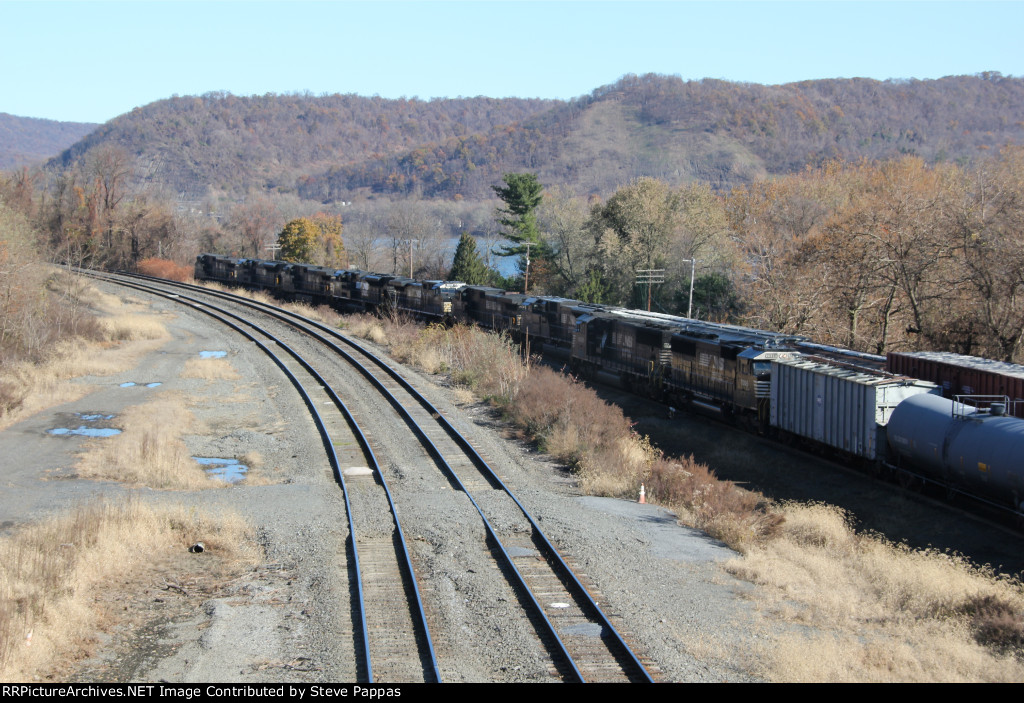 NS 6930 leads train 35A out of Enola yard while H15 couples the rest of its train alongside